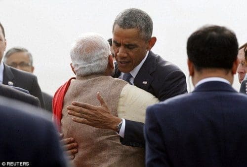 wpid-Obama-hugs-Narendra-Modi.jpg Embrace: President Barack Obama hugs India?s Prime Minister Narendra Modi as he arrives at Air Force Station Palam in New Delhi ahead of a three-day state visit
