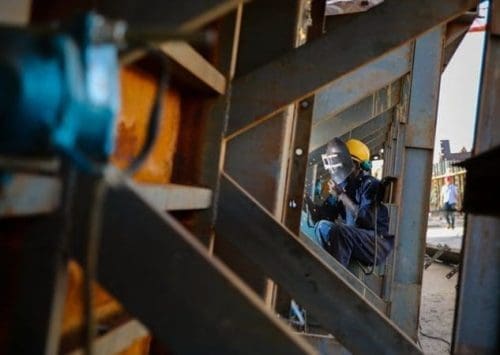A worker works at the T-beam factory on section six of Kenya's Standard Gauge Railway project, near Makueni, Kenya, on March 16, 2015. The project, expected to cost 3.8 billion U.S. dollars, involves the construction of about 480 kilometer railway line from the port city Mombasa to the capital city Nairobi. China Roads and Bridges Corporation (CRBC) is undertaking the project. (Xinhua/Pan Siwei) A worker works at the T-beam factory on section six of Kenya's Standard Gauge Railway project, near Makueni, Kenya, on March 16, 2015. The project, expected to cost 3.8 billion U.S. dollars, involves the construction of about 480 kilometer railway line from the port city Mombasa to the capital city Nairobi. China Roads and Bridges Corporation (CRBC) is undertaking the project. (Xinhua/Pan Siwei)