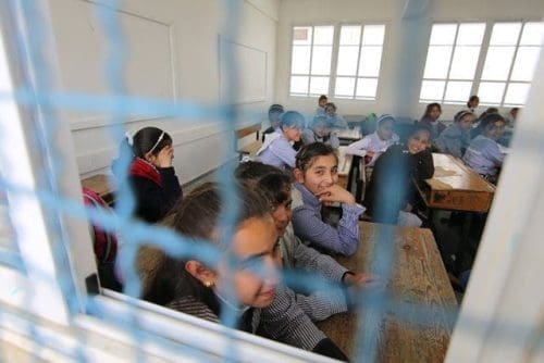 Palestinian students attend a lesson at a UN-run school which is reopened after it was damaged during the war between Israel and Hamas militants in Khuzaa village of the southern Gaza Strip city of Khan Yunis, on March 22, 2015. (Xinhua/Khaled Omar) Palestinian students attend a lesson at a UN-run school which is reopened after it was damaged during the war between Israel and Hamas militants in Khuzaa village of the southern Gaza Strip city of Khan Yunis, on March 22, 2015. (Xinhua/Khaled Omar)
