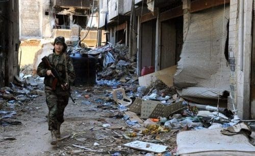 A female sniper patrols in Daraya suburb of the capital Damascus, Syria, on April 5, 2015. The snipers are members of the female force in Syrian Republican Guards. Their unit consists of around 800 volunteer, unmarried, female fighters- aged between 20 and 24 years old. Their task is to work alongside the Syrian army in its battle against the rebels. (Xinhua/Zhang Naijie) (jl) A female sniper patrols in Daraya suburb of the capital Damascus, Syria, on April 5, 2015. The snipers are members of the female force in Syrian Republican Guards. Their unit consists of around 800 volunteer, unmarried, female fighters- aged between 20 and 24 years old. Their task is to work alongside the Syrian army in its battle against the rebels. (Xinhua/Zhang Naijie) (jl)