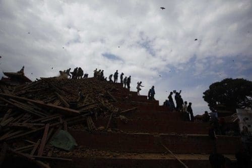 People clear the ruins of collapsed temples at Basantapur Durbar Square after an earthquake in Kathmandu, capital of Nepal, on April 25, 2015. Death toll in Nepal climbed to 711, the country's Home Ministry said Saturday afternoon, hours after a major earthquake struck the country. (Xinhua/Pratap Thapa) People clear the ruins of collapsed temples at Basantapur Durbar Square after an earthquake in Kathmandu, capital of Nepal, on April 25, 2015. Death toll in Nepal climbed to 711, the country's Home Ministry said Saturday afternoon, hours after a major earthquake struck the country. (Xinhua/Pratap Thapa)