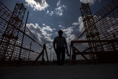Photo taken on July 14, 2015 shows a staff member walking inside the construction site of the Rostov Arena in Rostov-on-don, Russia. Russia will host the FIFA World Cup soccer tournament in 2018. (Xinhua/Li Ming) Photo taken on July 14, 2015 shows a staff member walking inside the construction site of the Rostov Arena in Rostov-on-don, Russia. Russia will host the FIFA World Cup soccer tournament in 2018. (Xinhua/Li Ming)