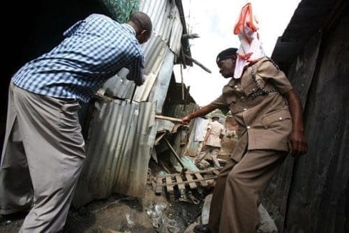 A chief (R) destroys a den during a crackdown on illicit brew at Motherland slums in Nairobi's Eastleigh estate, Kenya, July 14, 2015. Kenyan Interior Cabinet Secretary Joseph Nkaissery on Tuesday said that about 20,000 suspects have been arrested over illicit alcohol and 99 chiefs and sub-chiefs dismissed, and drastic action taken against 15 police officers in the war against the illicit brew. (Xinhua/John Okoyo) A chief (R) destroys a den during a crackdown on illicit brew at Motherland slums in Nairobi's Eastleigh estate, Kenya, July 14, 2015. Kenyan Interior Cabinet Secretary Joseph Nkaissery on Tuesday said that about 20,000 suspects have been arrested over illicit alcohol and 99 chiefs and sub-chiefs dismissed, and drastic action taken against 15 police officers in the war against the illicit brew. (Xinhua/John Okoyo)