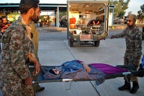Pakistani soldiers transfer an injured woman after the severe earthquake in northwest Pakistan's Peshawar, Oct. 27, 2015. Pakistani Information Minister Pervaiz Rashid said on Tuesday that the country would not seek international aid for the people affected by the powerful earthquake that killed nearly 250 people and displaced thousands others. (Xinhua/Umar Qayyum) Pakistani soldiers transfer an injured woman after the severe earthquake in northwest Pakistan's Peshawar, Oct. 27, 2015. Pakistani Information Minister Pervaiz Rashid said on Tuesday that the country would not seek international aid for the people affected by the powerful earthquake that killed nearly 250 people and displaced thousands others. (Xinhua/Umar Qayyum)