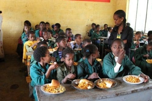 School Feeding Students of Kuskuwam Primary School have a meal which is through a school feeding program, in Addis Ababa, capital of Ethiopia, Nov. 26, 2015. The school feeding program is part of a 170,000 U.S. dollars fund from International Development Department of the China Foundation for Poverty Alleviation, through Yenat Weg Charitable Association to support more than 1,100 needy students in five Ethiopian public primary schools.(Xinhua/Michael Tewelde)