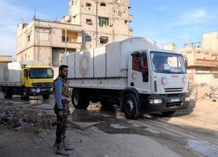 Aid trucks enter the rebel-held town of Douma, east of Damascus, Syria, on Feb. 13, 2016. The aid, delivered by the Syrian Arab Red Crescent(SARC), includes milk for kids, insulin, and other medicine for chronic diseases. (Xinhua/Ammar) Aid trucks enter the rebel-held town of Douma, east of Damascus, Syria, on Feb. 13, 2016. The aid, delivered by the Syrian Arab Red Crescent(SARC), includes milk for kids, insulin, and other medicine for chronic diseases. (Xinhua/Ammar)