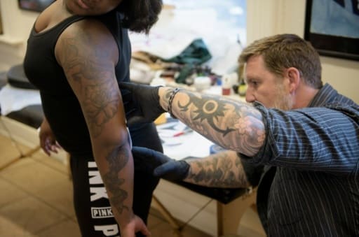 f7809cce8e62b9225c590342b36f2aab45479cf0 AFP / Brendan Smialowski Nearly half (47 percent) of Americans born in the 1980s and 1990s have at least one tattoo, according to a Harris poll