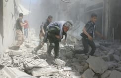 AFP/File / Ameer Alhalbi Syrians evacuate an injured man amid the rubble of destroyed buildings following a reported air strike on the rebel-held neighbourhood of Al-Qatarji, in Aleppo, on April 29, 2016 AFP/File / Ameer Alhalbi Syrians evacuate an injured man amid the rubble of destroyed buildings following a reported air strike on the rebel-held neighbourhood of Al-Qatarji, in Aleppo, on April 29, 2016