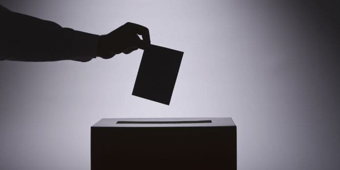 Person voting Person voting