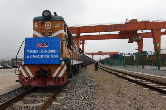 Railway Express Carting small commodities, clothing and other goods, China-Europe Railway Express No. X8024 (Yiwu-Madrid) trundled out of Yiwu West Station on May 13, 2017, a day before the Belt and Road Forum for International Cooperation kicked off. It was embarking on the 1,000th trip along the railroad freight line this year. A total of 612 more trips have been seen this year, up 158% compared with the same period last year. (Photo by People.cn)