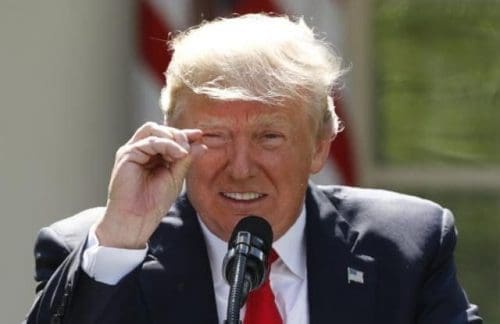 U.S. President Trump refers to temperature change as he announces decision to withdraw from Paris Climate Agreement at White House in Washington US President describes impact of Paris Accord