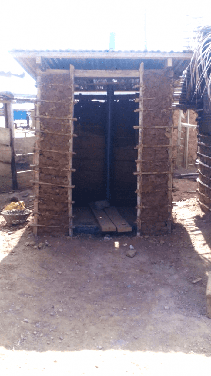 A household latrine completed with the plastic latrine slab