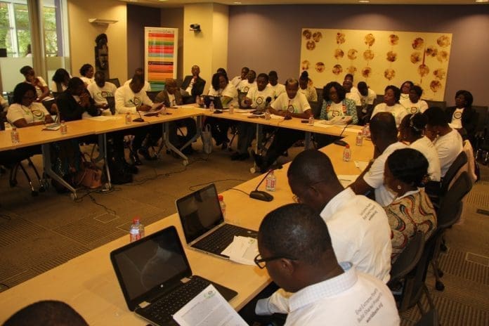shows a section of stakeholders making inputs at the session