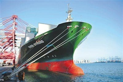ship berths A ship berths at a port of Qingdao, east China’s Shandong province for unloading containers on Jan. 13, 2018. (Photo from People’s Daily Online)