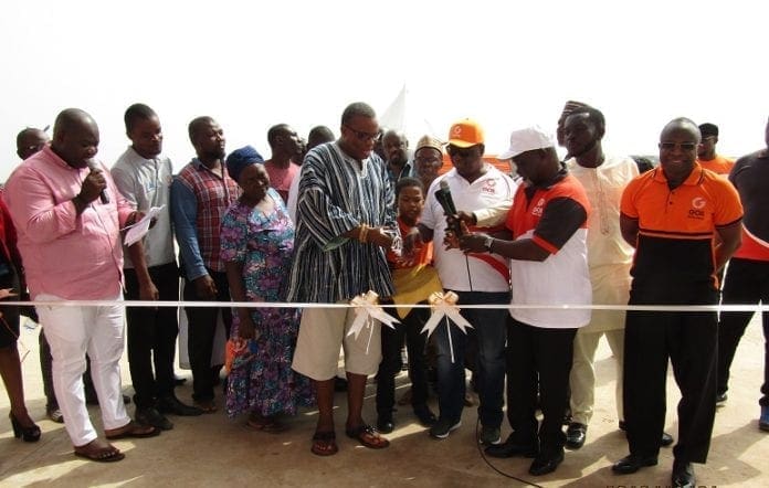 GOIL Target i Mr Patrick Akpe Kwame Akorli Group CEO of GOIL, assisted by the Brand Ambassador, Barimah Zoom Zoom Azumah Nelson, and other Officials cut the tape to open the station.