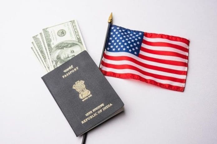 Indian passport with US currency notes and American flag in the background, symbolizing the effort of Indian workers seeking American H-1B visas to immigrate to America and earn American currency. Indian and Chinese workers are the ones most involved in the H1B visa program and affected by delays related to transitioning to green cards. GETTY Indian passport with US currency notes and American flag in the background, symbolizing the effort of Indian workers seeking American H-1B visas to immigrate to America and earn American currency. Indian and Chinese workers are the ones most involved in the H1B visa program and affected by delays related to transitioning to green cards. GETTY