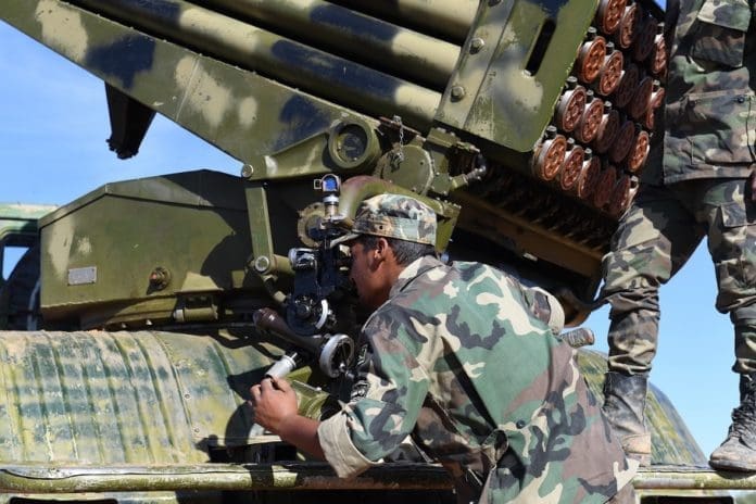 Syrian soldiers and military gears are seen in the city of Manbij in the northeastern countryside of Aleppo province, Syria, on Nov. 2, 2019. The Syrian army brought in new reinforcement to Manbij to protect the city against the Turkey-backed rebels in nearby areas. (Str/Xinhua)