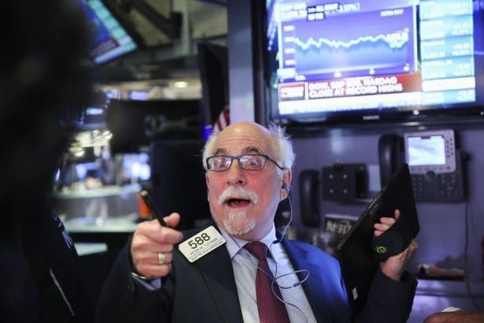 A trader works at the New York Stock Exchange in New York, the United States, on Nov. 4, 2019. U.S. stocks ended higher on Monday. The Dow Jones Industrial Average rose 114.75 points, or 0.42 percent, to 27,462.11. The S&P 500 rallied 11.36 points, or 0.37 percent, to 3,078.27. The Nasdaq Composite Index was up 46.80 points, or 0.56 percent, to 8,433.20. (Xinhua/Wang Ying)