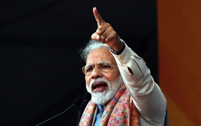 Indian Prime Minister Narendra Modi addresses his Bharatiya Janata Party's rally in New Delhi, India, on Dec. 22, 2019. Narendra Modi on Sunday refuted allegations that his government is discriminatory in the Citizenship Amendment Act (CAA) which has triggered massive protests nationwide. (Photo by Partha Sarkar/Xinhua)