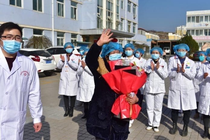 A patient of novel coronavirus is discharged from a hospital in Tianshui, northwest China’s Gansu province, Feb. 19, 2020. Photo by Zhou Wentao, People’s Daily Online