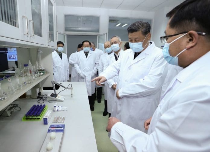 President Xi Jinping inspects COVID-19 scientific research at the Academy of Military Medical Sciences in Beijing, March 2, 2020. (Xinhua/Ju Peng)