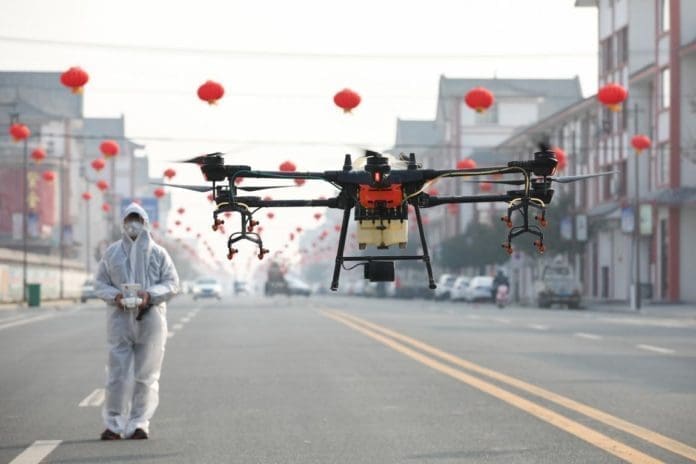 A staff member operates a drone to disinfect a street in Lianyungang, east China’s Jiangsu province, Feb. 9, 2020. Photo by Si Wei, People’s Daily Online A staff member operates a drone to disinfect a street in Lianyungang, east China’s Jiangsu province, Feb. 9, 2020. Photo by Si Wei, People’s Daily Online