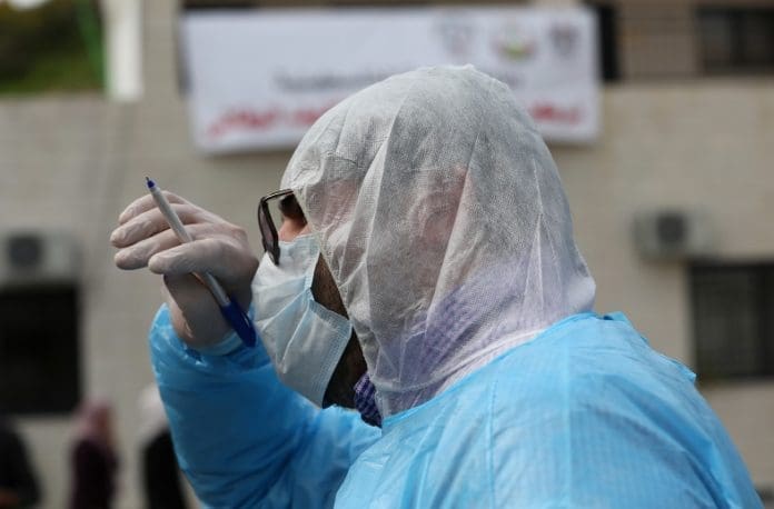 A member of Palestinian medical team is seen at an emergency center for monitoring, screening and preventive health care education about COVID-19, which was recently established by the Palestinian Ministry of Health, in the West Bank city of Nablus, March 9, 2020. Palestine on Monday reported six new cases of coronavirus, bringing the total number of the infected Palestinians to 25. (Photo by Ayman Nobani/Xinhua)
