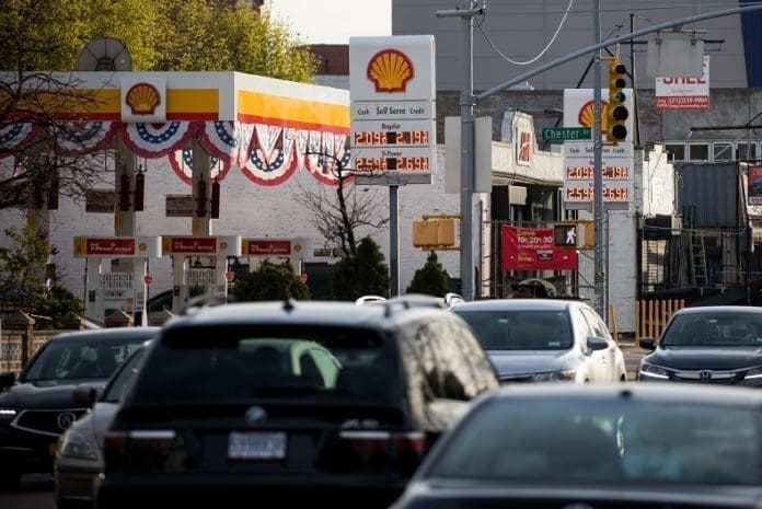 A sign displays gas prices at a gas station in the Brooklyn borough of New York, the United States, on April 20, 2020. U.S. oil prices crashed to the negative territory for the first time in history on Monday, fueled by pandemic-related demand shock and oversupply fears. The West Texas Intermediate (WTI) for May delivery shed 55.9 U.S. dollars, or over 305 percent, to settle at -37.63 dollars a barrel on the New York Mercantile Exchange, implying that producers would pay buyers to take oil off their hands. (Photo by Michael Nagle/ Xinhua)