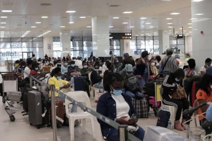Ghanaian evacuees from Lebanon going through immigration checks at the Kotoka international Airport in Accra Ghanaian evacuees from Lebanon going through immigration checks at the Kotoka international Airport in Accra