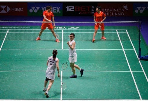 Japan's Misaki Matsutomo (bottom L) and Ayaka Takahashi (C) celebrate winning a point during the women's doubles quarterfinal match with China's Chen Qingchen (top R) and Jia Yifan (top L) at All England Badminton 2020 in Birmingham, Britain on March 13, 2020. (Photo by Tim Ireland/Xinhua) Japan's Misaki Matsutomo (bottom L) and Ayaka Takahashi (C) celebrate winning a point during the women's doubles quarterfinal match with China's Chen Qingchen (top R) and Jia Yifan (top L) at All England Badminton 2020 in Birmingham, Britain on March 13, 2020. (Photo by Tim Ireland/Xinhua)