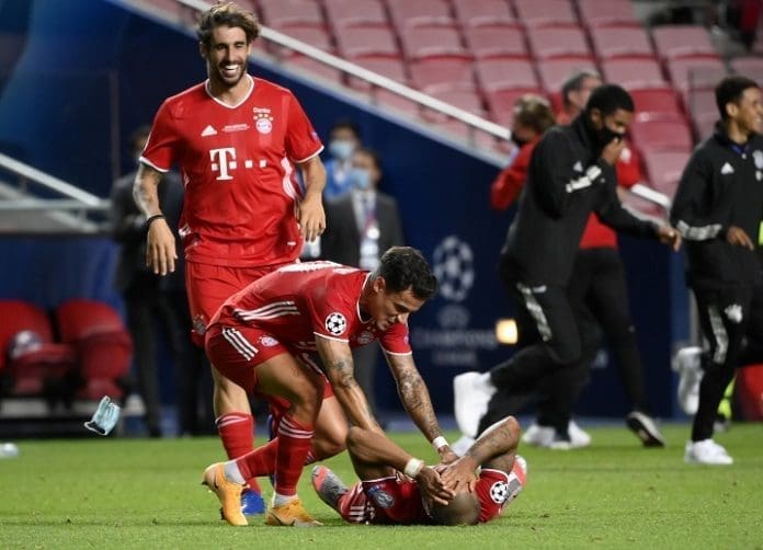 Champions League - Final - Bayern Munich v Paris St Germain - Estadio da Luz, Lisbon, Portugal - August 23, 2020 Bayern Munich's Philippe Coutinho with teammates celebrate after winning the Champions League, as play resumes behind closed doors following the outbreak of the coronavirus disease (COVID-19) Lluis Gene/Pool via REUTERS Champions League - Final - Bayern Munich v Paris St Germain - Estadio da Luz, Lisbon, Portugal - August 23, 2020 Bayern Munich's Philippe Coutinho with teammates celebrate after winning the Champions League, as play resumes behind closed doors following the outbreak of the coronavirus disease (COVID-19) Lluis Gene/Pool via REUTERS