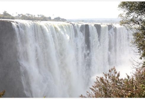 VICTORIA FALLS, Aug. 7, 2020 (Xinhua) -- Photo taken on August 6, 2020 shows Victoria Falls at the border of Zimbabwe and Zambia. Zimbabwe's president on Thursday launched the National Tourism Recovery and Growth Strategy in Victoria Falls to guide the recovery of tourism sector which was hard hit by the COVID-19 pandemic. (Xinhua/Wanda) VICTORIA FALLS, Aug. 7, 2020 (Xinhua) -- Photo taken on August 6, 2020 shows Victoria Falls at the border of Zimbabwe and Zambia. Zimbabwe's president on Thursday launched the National Tourism Recovery and Growth Strategy in Victoria Falls to guide the recovery of tourism sector which was hard hit by the COVID-19 pandemic. (Xinhua/Wanda)