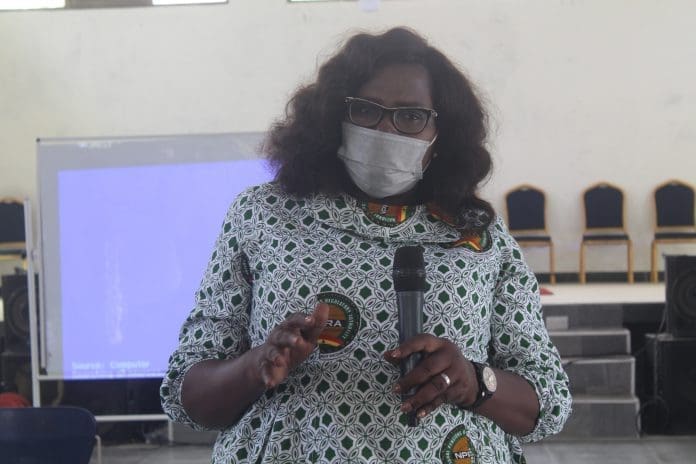 Mrs Rosina Akrofi standing