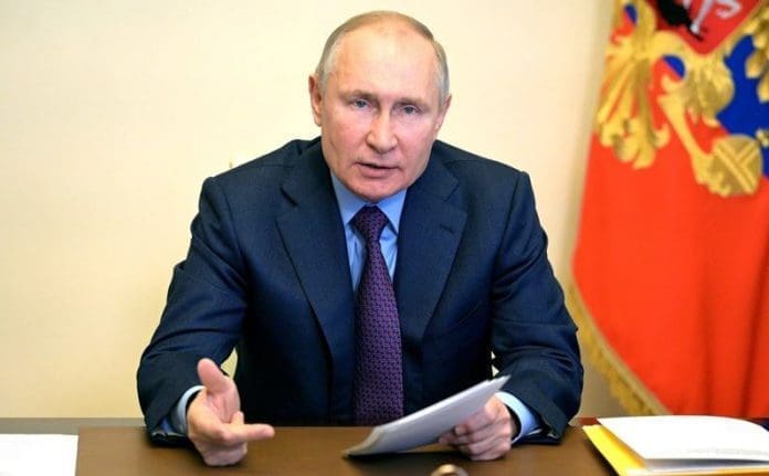 Russian President Vladimir Putin HANDOUT - 15 April 2021, Russia, Novo-Ogaryovo: Russian President Vladimir Putin attends a meeting of the State Council Presidium and the Agency for Strategic Initiatives, held via video conference, at the Novo-Ogaryovo state residence. Photo: -/Kremlin/dpa - ATTENTION: editorial use only and only if the credit mentioned above is referenced in full