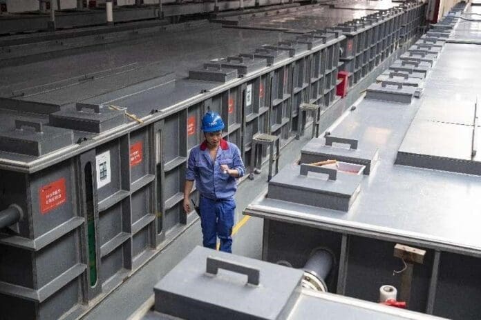 A worker is busy working on a battery recycling line at a workshop of a new material company in Huzhou, east China's Zhejiang province, Sept. 3, 2021. (Photo by Wang Jinyan/People's Daily Online) A worker is busy working on a battery recycling line at a workshop of a new material company in Huzhou, east China's Zhejiang province, Sept. 3, 2021. (Photo by Wang Jinyan/People's Daily Online)