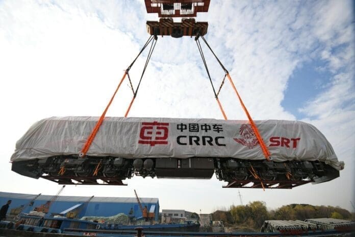 The CDA5B1 meter-gauge AC transmission diesel locomotives produced by CRRC Qishuyan Co., Ltd. for Thailand are loaded onto a ship at a wharf of Changzhou west port in Changzhou city, east China’s Jiangsu province, Dec. 20, 2021. (Photo by Shi Kang/People’s Daily Online) The CDA5B1 meter-gauge AC transmission diesel locomotives produced by CRRC Qishuyan Co., Ltd. for Thailand are loaded onto a ship at a wharf of Changzhou west port in Changzhou city, east China’s Jiangsu province, Dec. 20, 2021. (Photo by Shi Kang/People’s Daily Online)