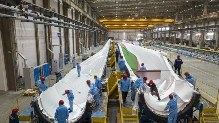 Wind turbines are being manufactured in an industrial park in Baotou, north China's Inner Mongolia autonomous region, March 15, 2023. (Photo by Li Qiang/People's Daily Online)