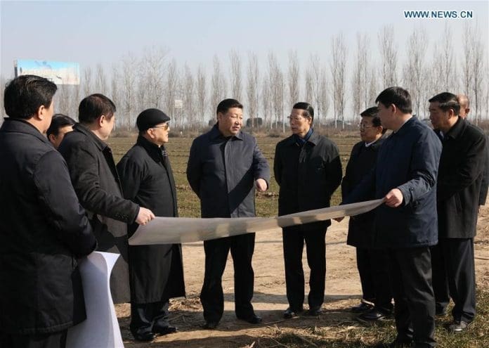 Chinese President Xi Jinping (C) inspects the Xiong'an New Area scheme in Anxin county of Baoding city, north China's Hebei province, Feb 23, 2017. (Photo by Lan Hongguang/Xinhua)