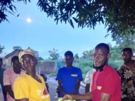 TENET Urges Youth To Embrace Savings And Investment TENET Partners Marketing Ltd distributes charity items during the inauguration of its Sogakope office, promoting savings, youth empowerment, and community development