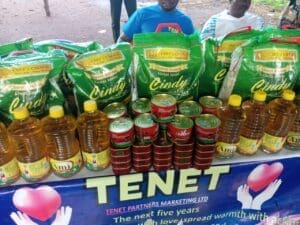 Food items including rice, vegetable oil, and tomato paste displayed at the inauguration of Tenet Partners Marketing Ltd’s Sogakope charity office to support vulnerable communities Food items including rice, vegetable oil, and tomato paste displayed at the inauguration of Tenet Partners Marketing Ltd’s Sogakope charity office to support vulnerable communities